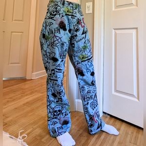 Loose fitting graffiti print jeans